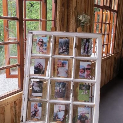 Use this old window as a photo frame or as a seating plan