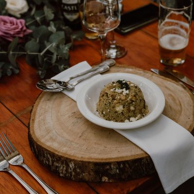 Cous-cous salad starter with basil pesto,cashew nuts and feta